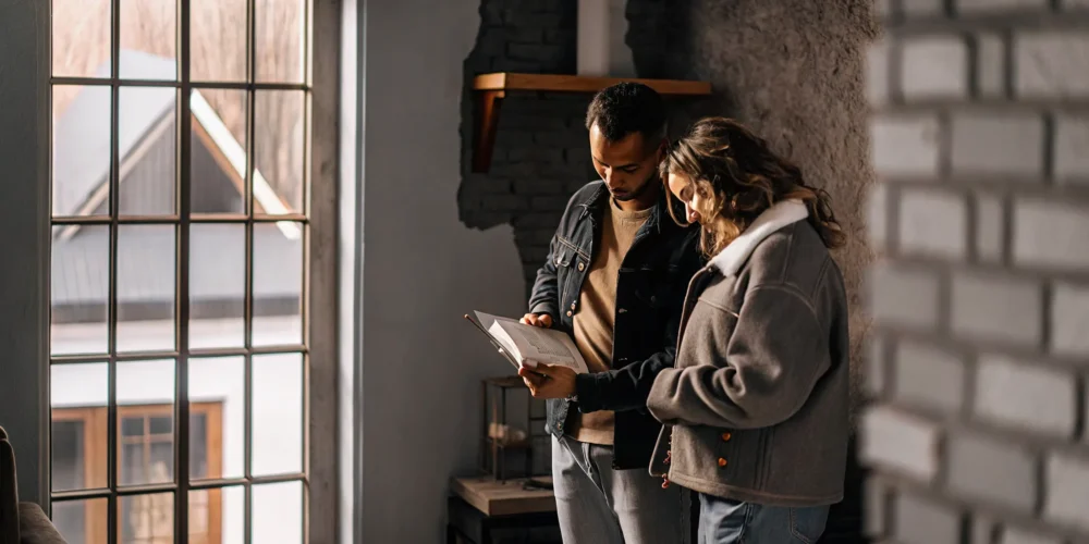 Borrower comparing mortgage rate, APR, fees, and total loan cost